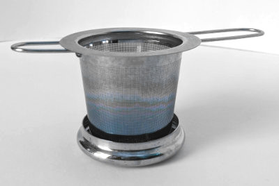 basket infuser on plain background